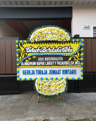 Papan Bunga Duka di Palas